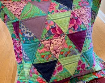 Unique pieced and quilted pillow in purple and teal