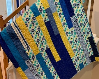 Adorable baby quilt in happy blues and yellows