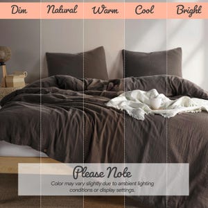 May include: A bed with a dark brown duvet cover and two matching pillows. A white blanket with a cup is draped over the bed. The text "Please Note" and a disclaimer about color variation are at the bottom.