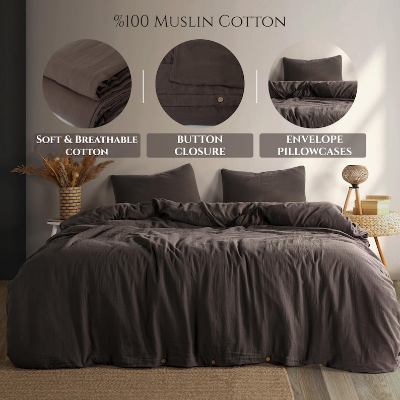 May include: A dark brown muslin cotton bedding set. The set includes a duvet cover and two pillowcases. The duvet cover has a button closure. The image also shows the text: "Soft & Breathable Cotton", "Button Closure", and "Envelope Pillowcases".