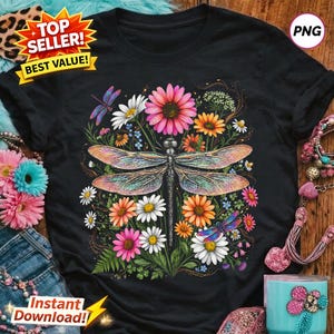 Peut inclure: T-shirt noir avec un motif de libellule colorée entourée de fleurs. La libellule a des ailes irisées et les fleurs sont dans les tons de rose, orange et blanc. Le t-shirt porte également le texte "Instant Download!"