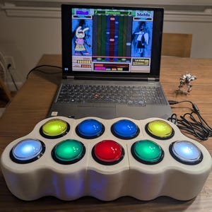 May include: A set of three ceramic mugs with a speckled, matte finish. The mugs are in shades of cream, light gray, and dark gray. Each mug has a simple, minimalist design and a rounded handle.