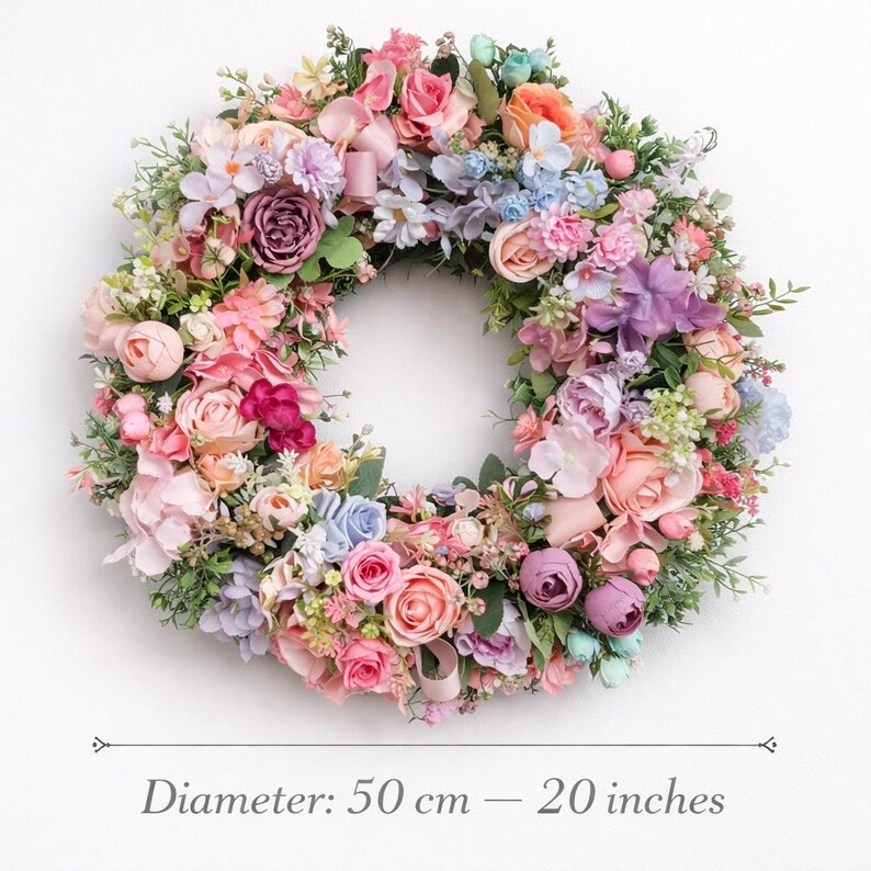 Pastel spring wreath with pink, peach, lavender and blue flowers