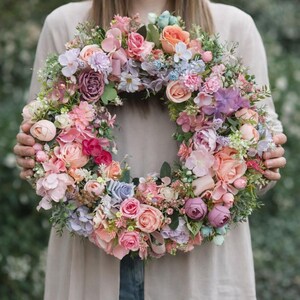 Handmade floral wreath with soft pastel colors