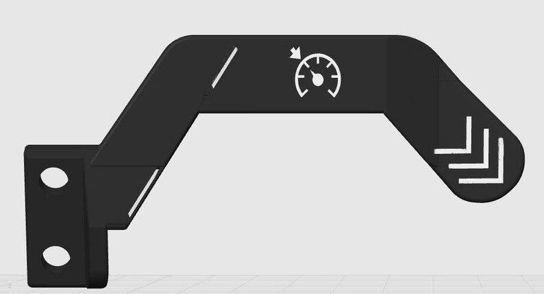 May include: A black, angular bracket featuring a gauge icon and directional arrows. The bracket has two holes on the vertical section and angled sections with white lines. The gauge icon has a needle pointing to the left.