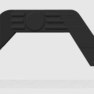 May include: A black, angled component with a rounded end and a right-angled section with two circular holes. The design incorporates a central circular detail and three parallel, raised rectangular features.