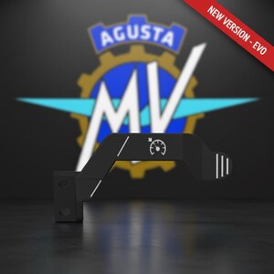 May include: Black motorcycle component with white detailing, including a speedometer symbol. The background showcases the MV Agusta logo, with a red banner reading "NEW VERSION - EVO". The logo features the word "AGUSTA" and the letters "MV".