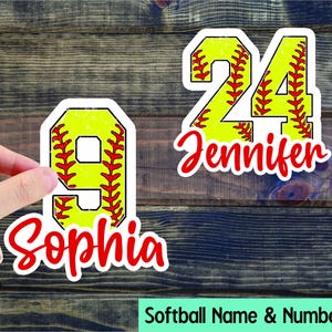 May include: Softball name and number stickers. The image shows three stickers with softball-themed designs. Each sticker features a yellow number with red stitching, a white border, and a name in red script. The numbers are 10, 9, and 24. The names are Lacey, Sophia, and Jennifer.