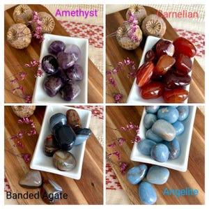 May include: Four square images showcasing different types of polished gemstones. The top left displays Amethyst, the top right Carnelian, the bottom left Banded Agate, and the bottom right Angelite. Each type is in a white dish on a wooden board, with dried flowers.