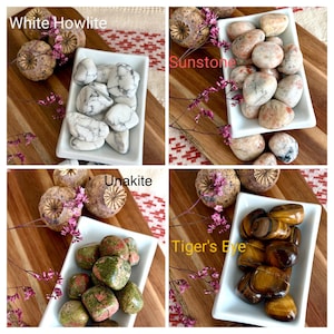 May include: Four square images showcasing different types of polished gemstones. The top left displays White Howlite, the top right Sunstone, the bottom left Unakite, and the bottom right Tiger's Eye. Each type is in a white rectangular dish on a wooden surface.