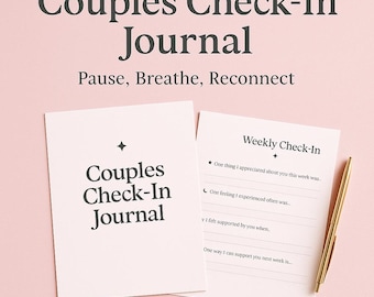 May include: A Couples Check-In Journal with the text "Pause, Breathe, Reconnect" on a pink background. The journal includes a cover and an open page with prompts for weekly check-ins. A gold pen rests on the open page.