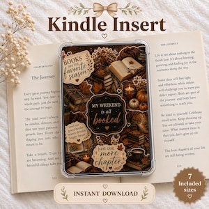 May include: A clear Kindle insert featuring a dark brown collage of autumn-themed book illustrations, including stacks of books, pumpkins, and mugs. Text includes 'BOOKS are my favorite season', 'MY WEEKEND is all booked', 'cool air good books warm drinks happy heart', and 'just one more chapter'.
