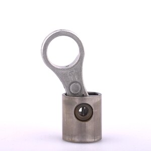 May include: A silver-colored piston and connecting rod assembly, likely from an engine. The piston is cylindrical, and the connecting rod has a circular end. The parts are set against a white background.