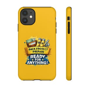 May include: Yellow iPhone case featuring a graphic design. The design includes a brown banner with the words "PACK PROTECT PREPARE" and a blue banner with the words "READY FOR ANYTHING!". The case also features illustrations of money, tools, and other items.