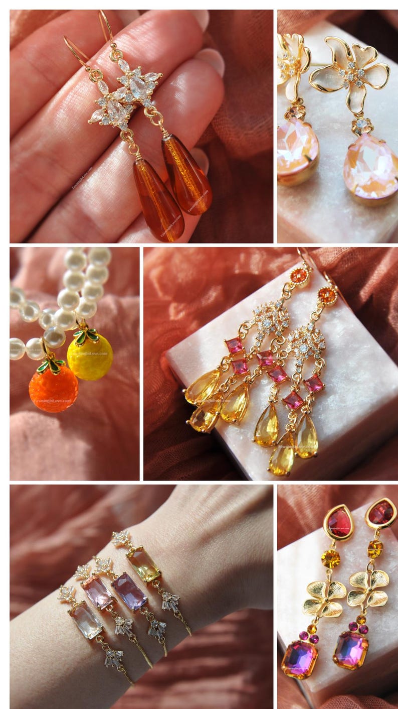 May include: A collection of gold-toned jewelry featuring earrings and a bracelet. The earrings showcase various designs, including teardrop-shaped amber-colored stones, floral accents, and colorful gemstones. The bracelet displays rectangular and square-cut stones.
