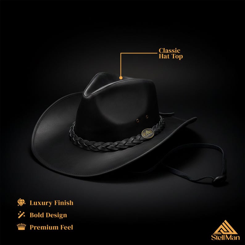 May include: A black cowboy hat with a braided band and a metal emblem. The hat has a classic top and a luxury finish. The design is bold, and the feel is premium. The hat has a chin strap.