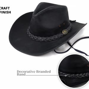 May include: Black cowboy hat with a decorative braided band and a chin strap. The hat has a premium finish and is labeled "Western Craft". The hat has a metal emblem on the band.