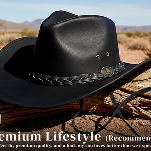 May include: A black cowboy hat with a braided band and a decorative emblem. The hat has a wide brim and is set against a desert landscape. The text "Premium Lifestyle (Recommended)" is visible.