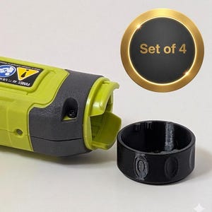 May include: A lime green and gray cordless power screwdriver with a black accessory. A gold-rimmed black circle displays "Set of 4". The screwdriver has a yellow warning label and a dial with the number 2.
