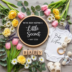 May include: A pregnancy announcement featuring a black letter board with the text "We've been keeping a Little Secret ~ May 2026". A white babygrow with "Baby Williams" printed on it, surrounded by flowers, baby toys, and shoes.