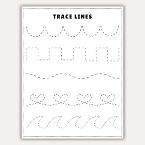Op de afbeelding: Een wit werkblad met de tekst "TRACE LINES" bovenaan. Het werkblad bevat verschillende stippellijnen in verschillende patronen, waaronder golven, harten en zigzags, ontworpen om te oefenen met traceren.