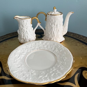 This is a vintage Royal Stafford coffee set in the "Old English Oak" pattern.