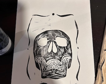 Grabado en linóleo de calavera