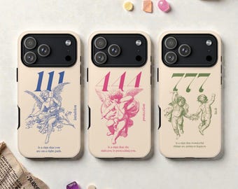 May include: Three phone cases with angel illustrations and the numbers 111, 444, and 777. Each case has a different color scheme: blue, pink, and green. Text on the cases includes "intuition," "protection," and "luck."