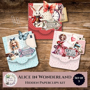 May include: A set of three Alice in Wonderland hidden paperclip kits. Each kit features a different design with illustrations of characters and quotes from the story. The kits are in red, light blue, and pink with decorative edges.