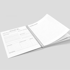 Colorful One-on-One Meeting Notebook flat lay on marble office desk with flowers and workspace accessories