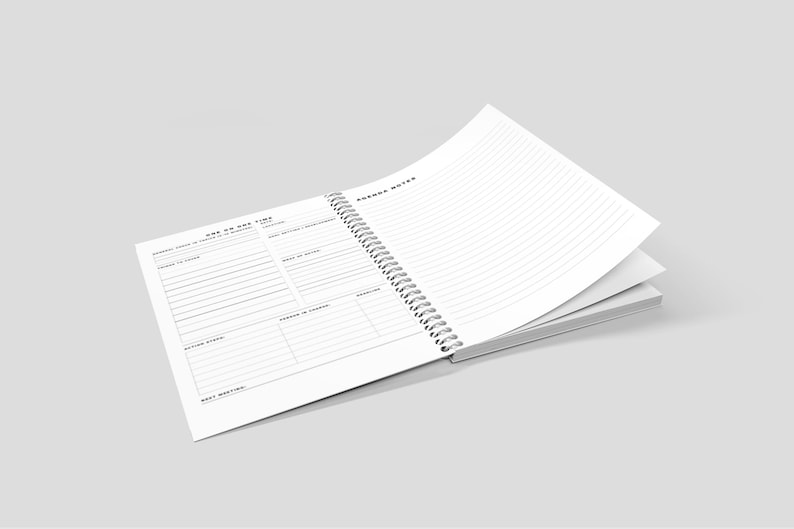 Colorful One-on-One Meeting Notebook flat lay on marble office desk with flowers and workspace accessories