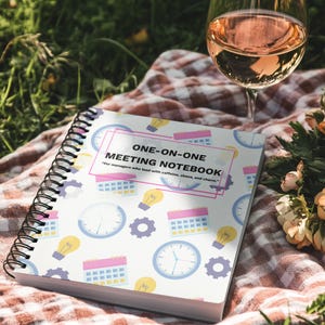 Colorful One-on-One Meeting Notebook spiral journal in an outdoor picnic lifestyle setting