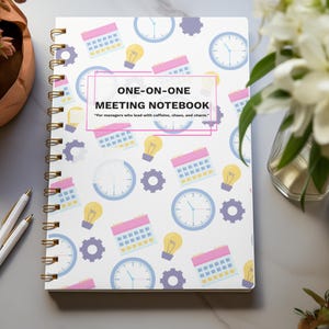 Colorful One-on-One Meeting Notebook flat lay on marble office desk with flowers and workspace accessories