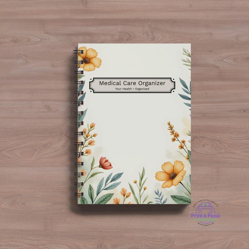 Floral medical care organizer spiral notebook mockup featuring soft botanical flowers and healthcare planning design on a wood desk background.