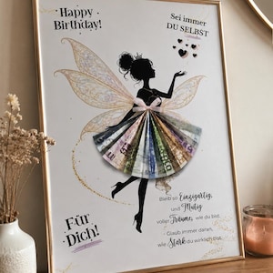 May include: A framed print featuring a black silhouette of a fairy with iridescent wings and a skirt made of folded paper currency. The text reads Happy Birthday, Sei immer DU SELBST, F&uuml;r Dich, and a German quote about being unique and brave.