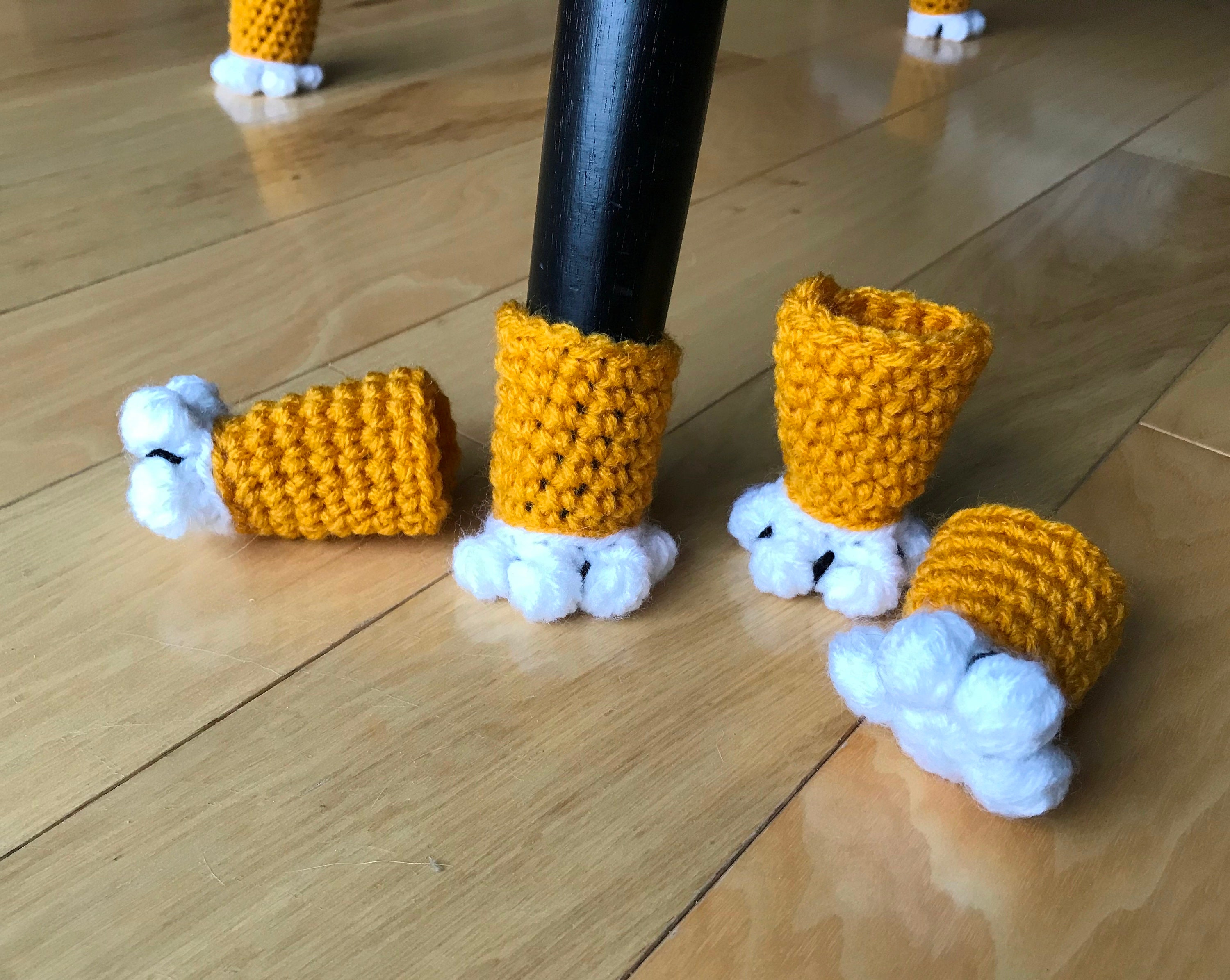 Currently making cat paw chair socks, and I'm dying over how cute
