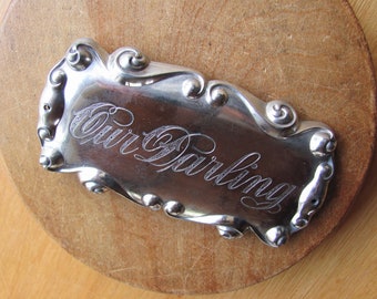 Casket Plaque Funeral Plate Memorial "Our Darling" Engraved Ornate Script Fancy Curled Edges Silver Metal Flat Clean Smooth Antique Vintage