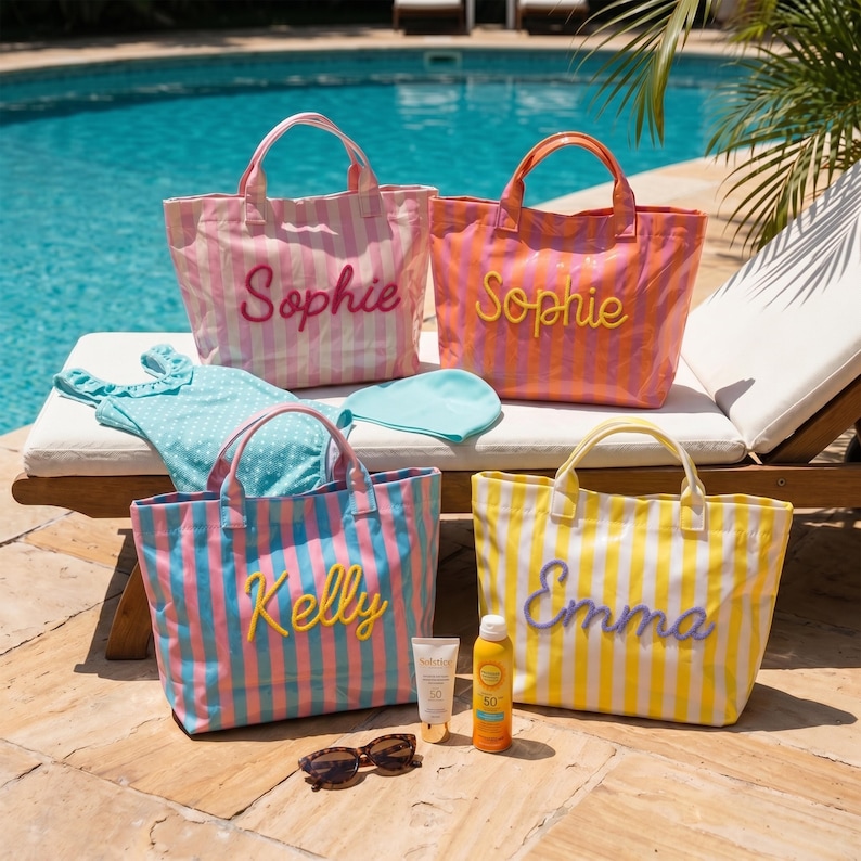 May include: Four striped tote bags with personalized names in raised lettering, including Sophie, Kelly, and Emma. The bags are accompanied by a blue polka-dot swimsuit, a light blue swim cap, a tube of sunscreen, and brown sunglasses.
