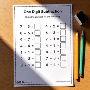 One digit subtraction worksheet with problems including 5 minus 3 and 9 minus 3 with answer boxes for kids