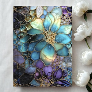 May include: A rectangular wall art piece featuring a mosaic-style floral pattern composed of translucent, iridescent resin segments in shades of teal, blue, and purple, outlined in gold, with a central cluster of small, textured gold circles.