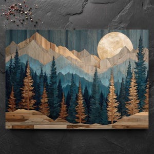 May include: A wall art piece featuring a layered wooden landscape with a large, circular, golden moon rising over jagged mountain peaks. The scene includes a dense forest of tall, slender pine trees in shades of deep blue and natural wood tones.