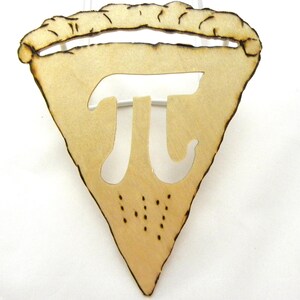 May include: A wooden pie slice ornament with a cut-out of the mathematical symbol pi.