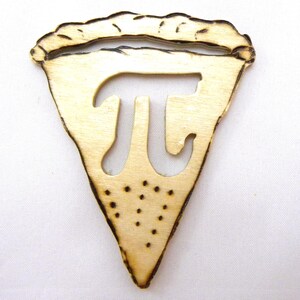 May include: A wooden pie slice ornament with the mathematical symbol pi cut out of the center. The ornament is a light brown color and has a slightly burnt appearance.