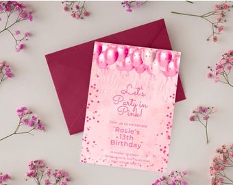 May include: A pink birthday invitation with the text "Let's Party in Pink!" and "Rosie's 13th Birthday". The invitation is on top of a burgundy envelope, surrounded by pink flowers. Pink balloons are at the top of the invitation.