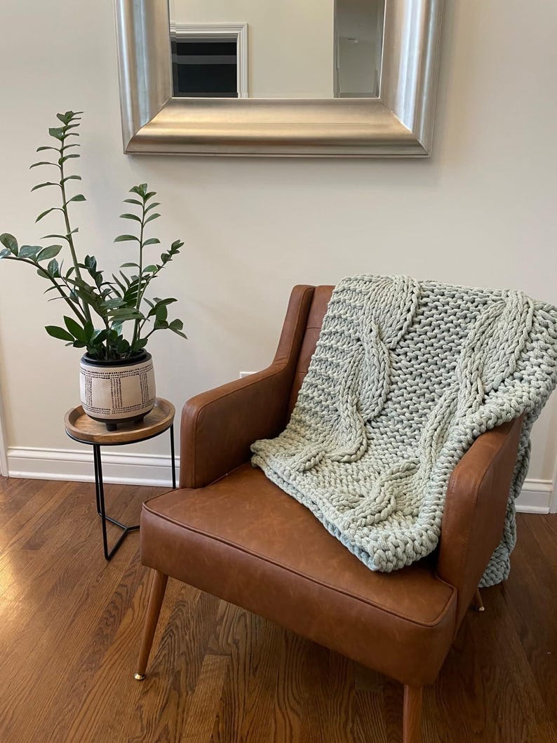 Luxury welcome home blanket gift for new homeowners, elevated alternative to traditional realtor closing gifts and client gifts