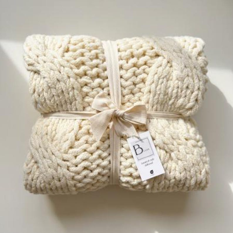 Luxury cable knit throw blanket in ivory, a personalized realtor client gift for buyers, closing day, and new home celebrations