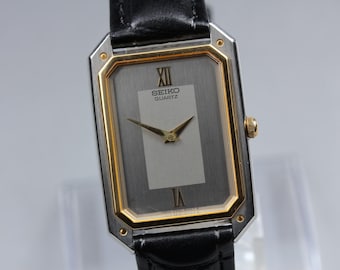 Vintage 1983 [near mint] seiko 6530-5000 two tone roman 25mm quartz men's watch