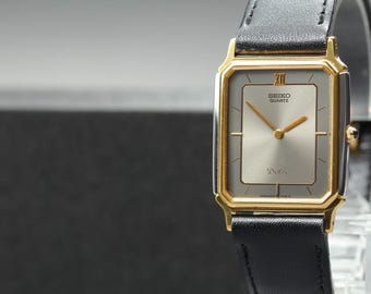 Vtg 1985 [n mint] vintage 1988 seiko dolce 9520-5140 quartz rectangle mens watch