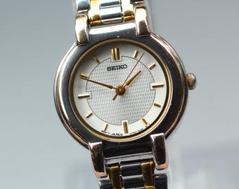 Reloj de cuarzo para mujer Seiko V701-1791 de 24 mm, plateado, dos tonos, vintage, 1995, casi nuevo*