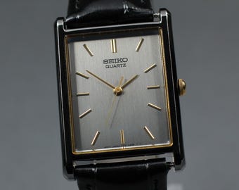 Vintage 1992 [n mint] seiko 7n01-5b50 tank square silver 25mm quartz men's watch